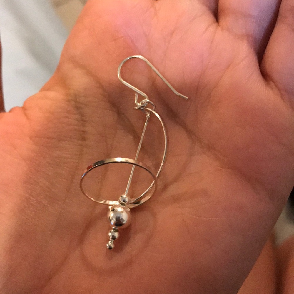 NWOT silver unique hanging earrings